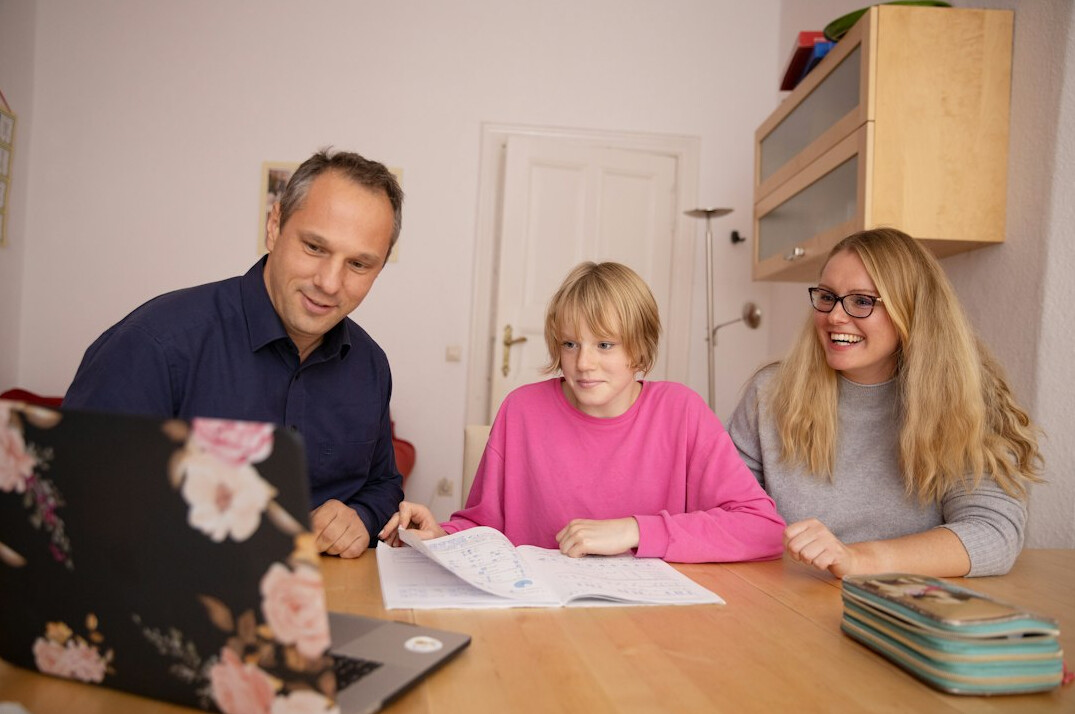 family discussing budget at home