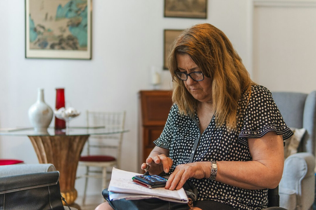 person reviewing budget documents